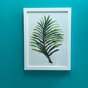 Framed portrait of a palm leaf